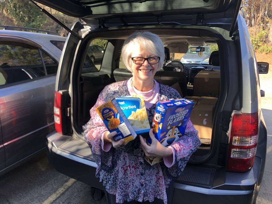 Frank Cawood and Associates Donate Needed Food Items